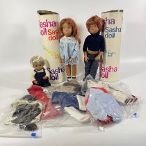 A Gregor doll, Sasha doll and baby.  7 sets of clothes including tartan Sasha outfit, corduroy