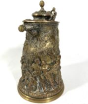 A 19th Century electroplated wine jug with relief figural decoration throughout. Unmarked but