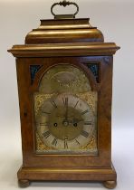 An 18th Century and later bracket clock.  The dial signed Joseph Martineau Senior, London. With a