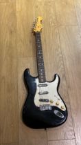 Squires Stratocaster guitar made in Japan by Fender.  Marked Fender on reverse and 2 stickers.