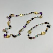 ***LOT WITHDRAWN*** A spectacle set gemstone necklace and matching bracelet featuring amethyst,