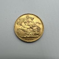 An Edward VII gold sovereign coin, dated 1910.