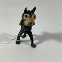 An early cast metal figure of Felix the Cat. Approximately 7cm tall. Original paintwork. Wear to