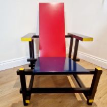 Cassina 635 Red and Blue lounge chair designed by Gerrit Thomas Rietveld.  The frame in yellow and