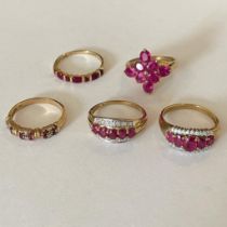 A collection of five 9ct yellow gold ruby set rings. To include three ruby and diamond set rings,