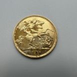 Edward VII 1906 gold half sovereign coin.