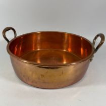 Large 19th century copper jam/preserve pan with twin handles. Approximately 45.5cm in diameter.