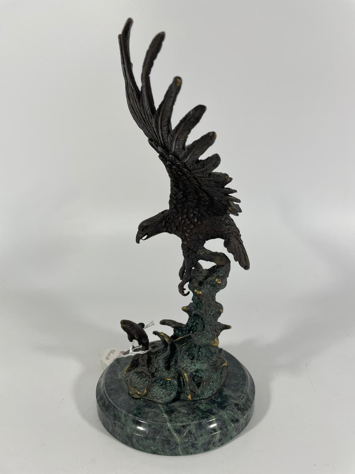 A bronze group of an eagle about to catch a leaping salmon. Approximately 25cm tall with good - Image 4 of 7