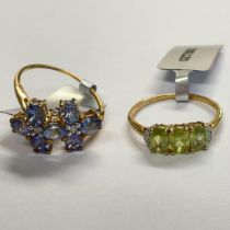 Two 9ct yellow gold rings: an Ambilobe sphene and diamond ring and a Tanzanite and white zircon