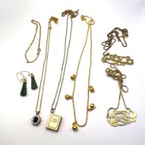 A collection of jewellery featuring two 9ct gold pendants and chains, a 9ct gold bracelet. Total