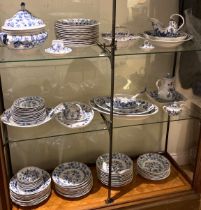 A large collection of Meissen and Zwiebelmuster blue and white flowering onion pattern tableware.