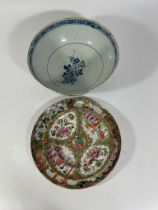 An 18th Century Delft punch bowl with polychrome floral decoration. Approximately 26.5cm in