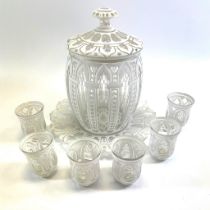 A Bohemian white overlay glass lidded punch bowl on stand.  33cm tall with 6 matching beakers 9cm