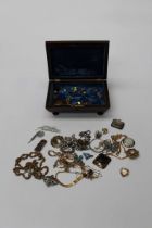 A collection of silver and costume jewellery to include two as found silver and enamel brooches, a