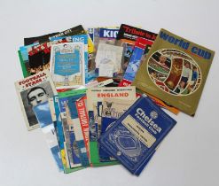 A quantity of predominately Chelsea FC football programmes and memorabilia , to include 90's and