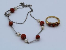 A collection of coral jewellery comprising a coral and cultured pearl necklace, stamped 9ct to the