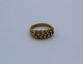 An 18ct gold ( hallmarked Chester) keeper ring, size O. Weight approximately 6.0 gm