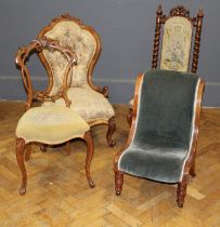 Four pieces of seating furniture, including two nursing chairs, a barley twist frame side chair