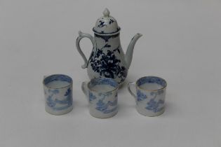 An 18th century Worcester First period blue and white coffee pot and cover, damaged, together with