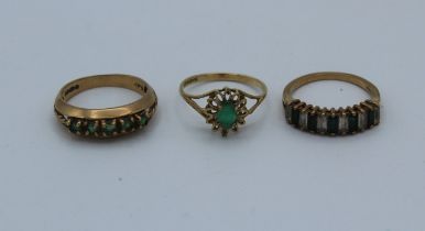Three 9ct gold rings, two set with emeralds, gross approximate weight 6.6gms