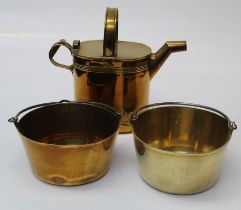 A Victorian brass water can, 40cm high, together with two preserve pans each with steel swing