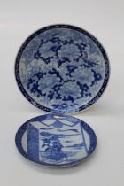 Two late 19th century Japanese porcelain blue and white chargers, each unmarked, the larger 41cm