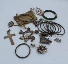 A collection of vintage and antique silver jewellery to include a watch and Albert charm bracelet