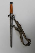 A WWII German Army Officers Dagger , circa 1940, with an aluminium scabbard and an orange plastic