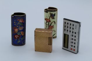 A collection of cigarette lighters and cases. Comprising a gold plated JC Dupont, Paris vintage