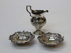 Collection of Sterling silver, featuring an 18th century, footed cream jug with floral embossed