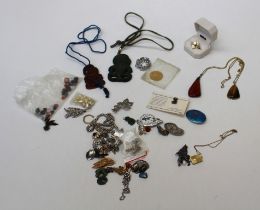 A collection of silver and costume jewellery to include Thai silver, enamelled pieces and nephrite