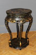 A mid 20th century Japanese black lacquered and gilt chinoiserie decorated two tier lamp/ bronze