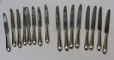 Eight Elizabeth II silver hollow handled dinner knives, with stainless steel blades. All