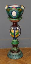 A late 20th century un-marked Minton type majolica glazed jardinière on stand, total height 112cm