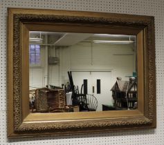 A 19th century moulded gesso framed wall mirror, with later plain rectangular plate, 76 x 97cm
