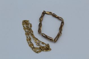 A 9ct gold bracelet along with a flower link 9ct gold necklace. Gross weight 14.3 gms approximately