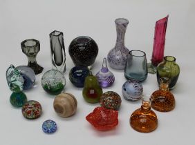 A collection of studio glassware and paperweights, to include ten glass paperweights including three