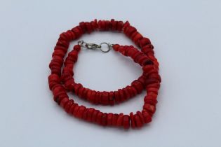 Red coral necklace, featuring roundels of coral. Untested for treatment, 48cm in length