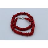 Red coral necklace, featuring roundels of coral. Untested for treatment, 48cm in length