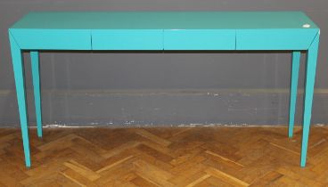 A modern aqua blue console table, the rectangular raised on square tapered legs, width 162cm