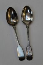 A silver fiddle pattern dessert spoon, William Eaton, London, 1829, 70gm, together with a silver