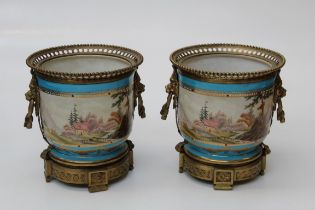 A pair of 20th century Sevres - type gilt metal mounted cachepot. Faux marks, 28 x 30cm