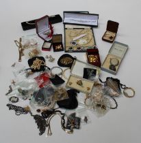 A large quantity of vintage and contemporary costume jewellery to include an interchangeable clasp