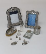 A collection of sterling silver items, two wine labels, 20.3gm, four thimbles, 21.7gm, an initialled