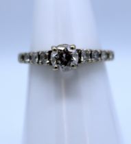 18ct White Gold approx 0.50ct Solitaire Round Brilliant Cut Diamond ring with approx. 0.25ct Round