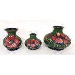 3 x Moorcroft green ground vases , various Moorcroft back stamps decorated in the Hibiscus