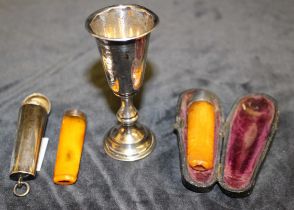 A Victorian silver cheroot case with hinged cover, Chester 1901 and the amber cheroot holder with