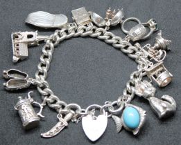 Sterling Silver Charm Bracelet with Thirteen Charms and Heart Padlock with Safety Chain. Some of the