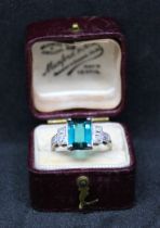 Art Deco Unmarked White Metal Tourmaline and Diamond Ring.  The ring contains a Rectangular Cut-