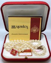 Majorica approx 22" Pearl Necklace with International Guarantee and original Majorica box.  The